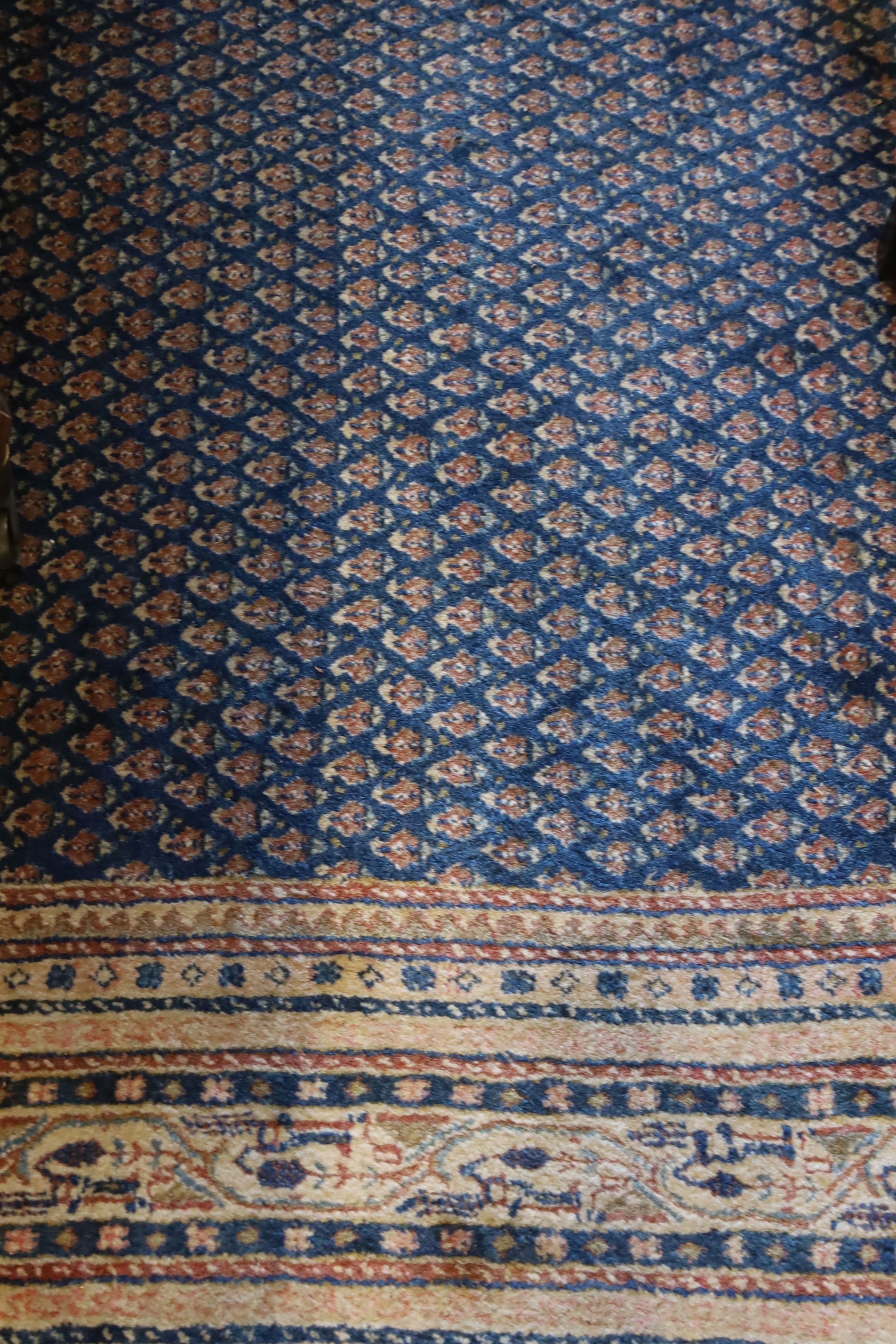 A Tabriz blue ground carpet